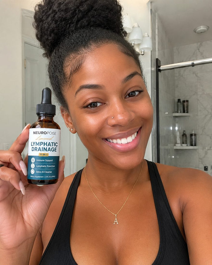 Keisha B. holding her Neuropoise Lymphatic Drainage Drops bottle