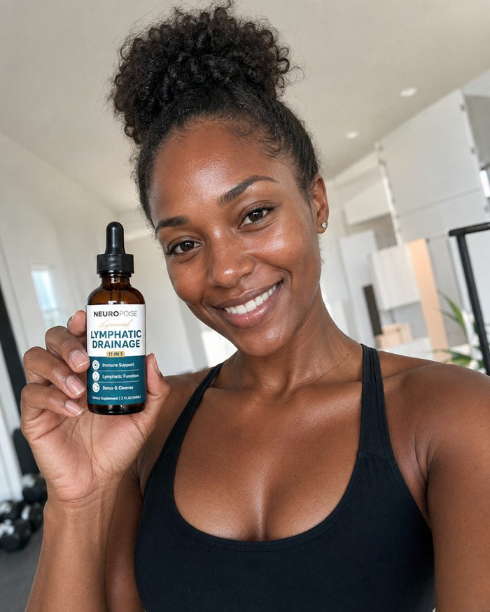 Alicia M. holding her Neuropoise Lymphatic Drainage Drops bottle