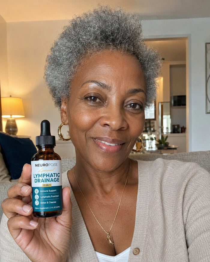 Gloria F. holding her Neuropoise Lymphatic Drainage Drops bottle